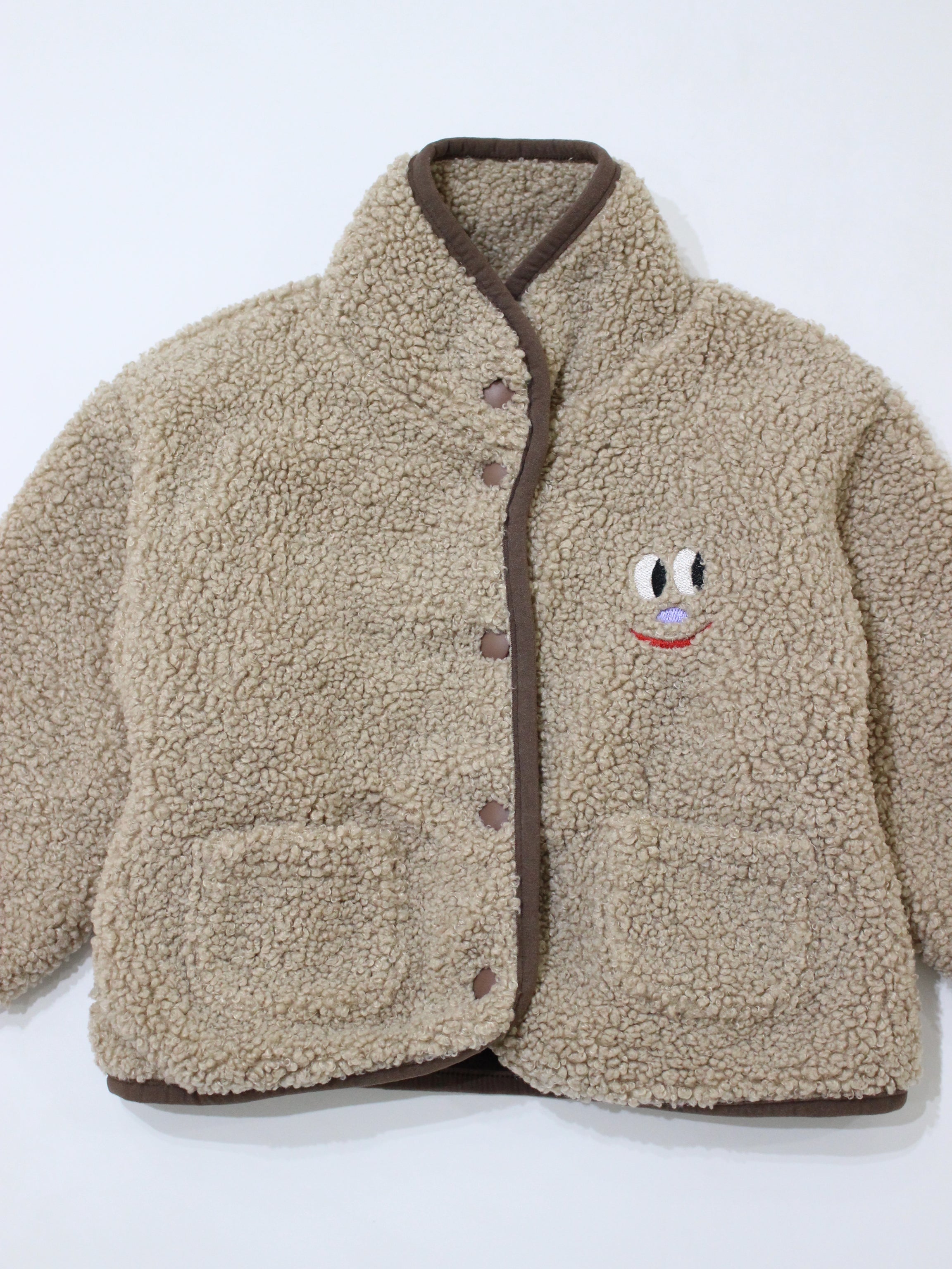 The Campamento Smiling Face Teddy Baby Jacket