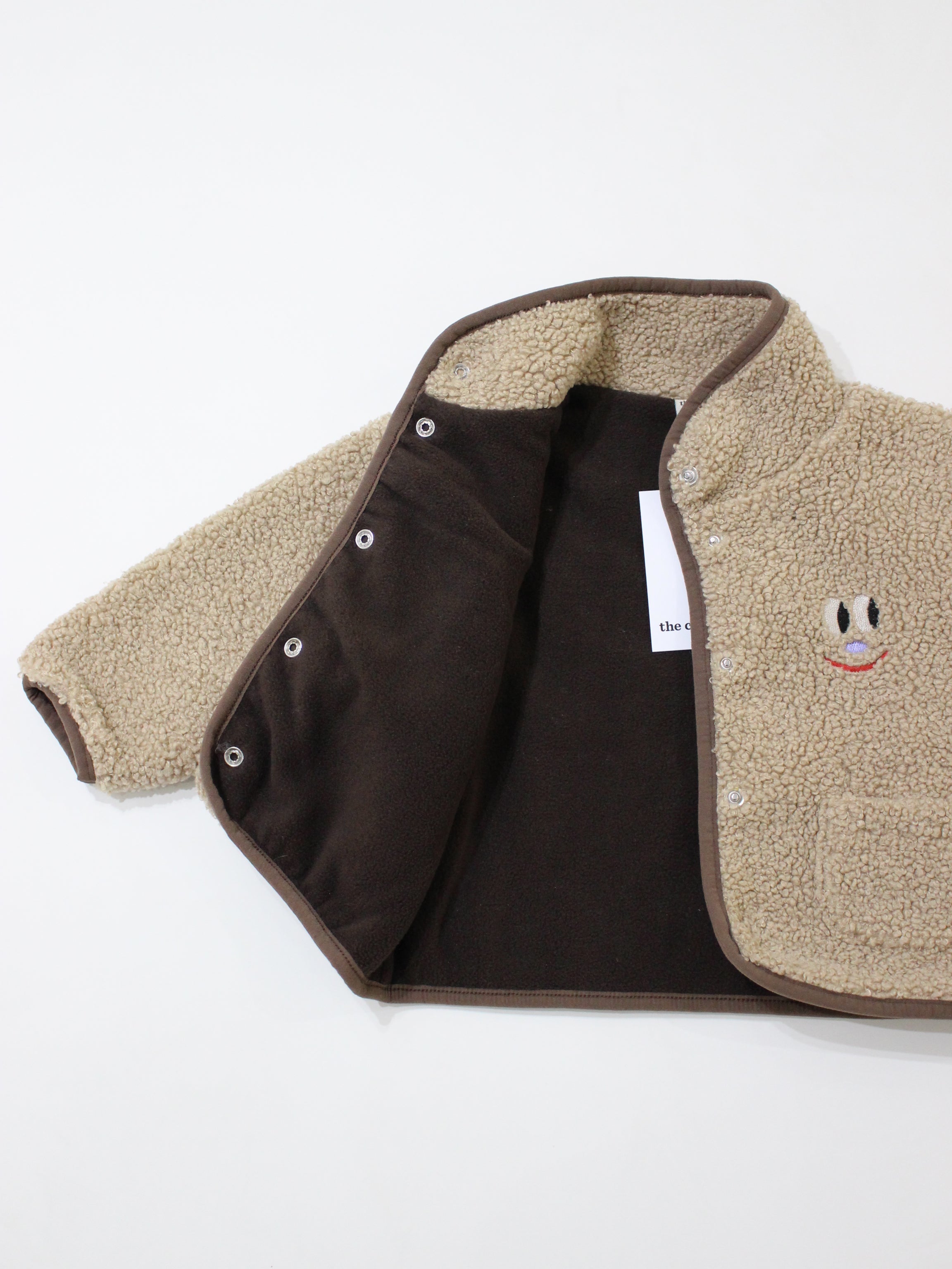 The Campamento Smiling Face Teddy Baby Jacket
