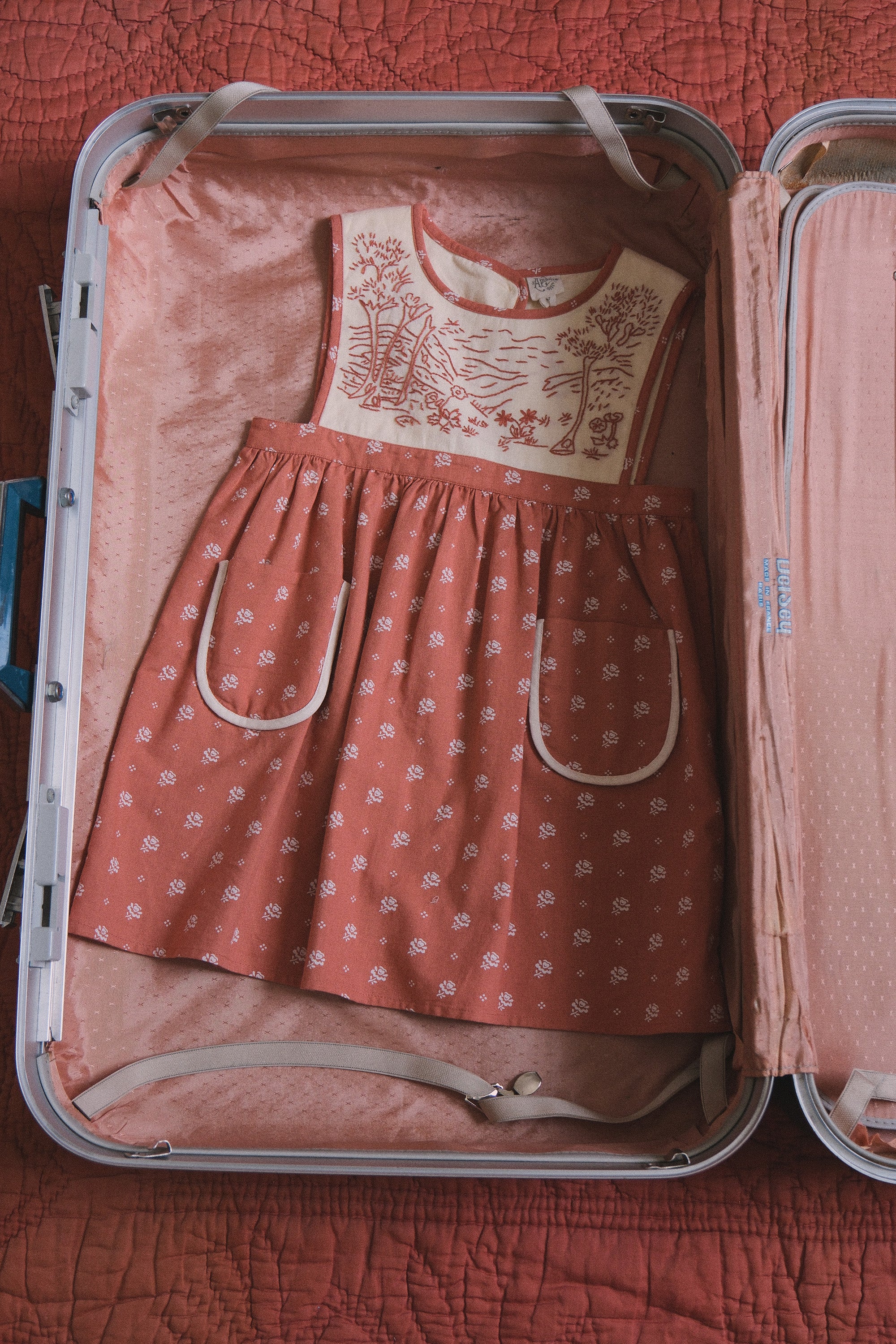APOLINA BIBI HAND EMBROIDERED PINAFORE - MOUNTAIN CALICO JAM