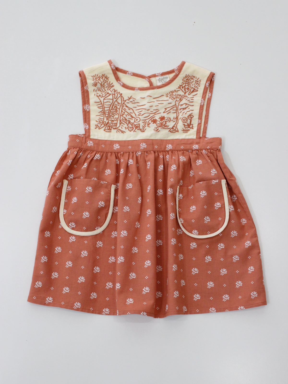 APOLINA  BIBI HAND EMBROIDERED PINAFORE - MOUNTAIN CALICO JAM